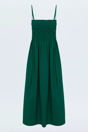 Breezy day dress crafted from a flowing, lightweight fabrication designed for warm weather wear. Smocked bodice with ruched design details, topped with adjustable shoulder straps.&nbsp;