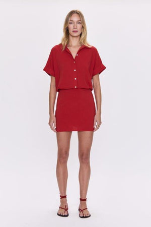 Unleash your quirky side with the Pistola Blythe shirt dress. This short sleeve dress is perfect for any occasion, keeping you cool and stylish all day long. Stand out from the crowd with this playful and versatile piece. (Only 34 words!)