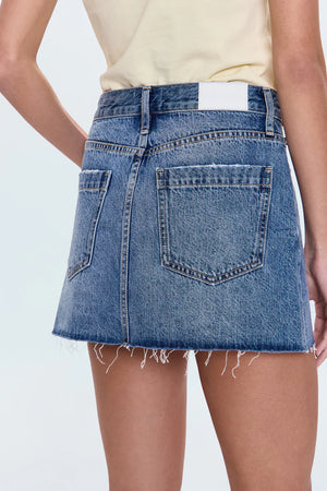 Jaunty mini skirt that sits low on the hips for breezy, cool-girl styling. Crafted from rigid non-stretch denim for an expert fit, and offered in a medium blue denim wash with blasted fading.