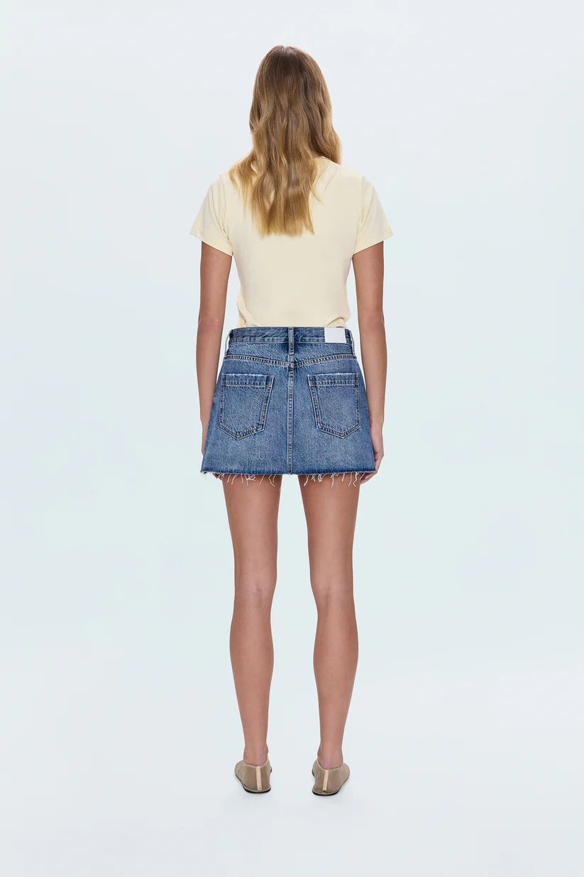 Jaunty mini skirt that sits low on the hips for breezy, cool-girl styling. Crafted from rigid non-stretch denim for an expert fit, and offered in a medium blue denim wash with blasted fading.