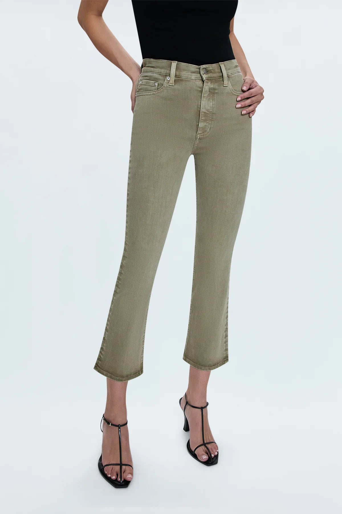 Our best selling bootcut silhouette with a high rise waist and 27" hem length with a clean finish. Crafted from our best selling comfort-stretch denim with clean finishes and free of distressing. Green Willow is a soft, warm olive green colored denim with tonal stitching and chrome hardware.