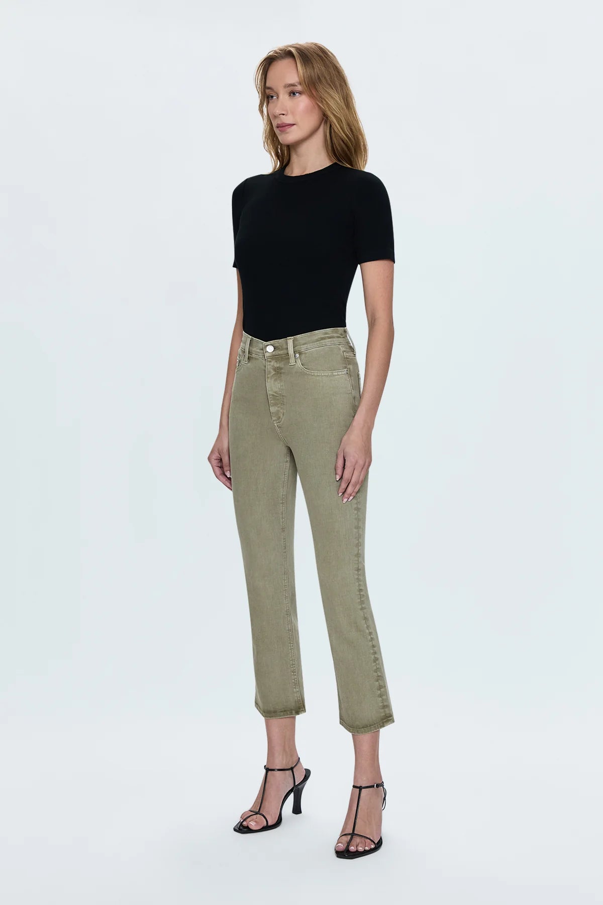 Our best selling bootcut silhouette with a high rise waist and 27" hem length with a clean finish. Crafted from our best selling comfort-stretch denim with clean finishes and free of distressing. Green Willow is a soft, warm olive green colored denim with tonal stitching and chrome hardware.