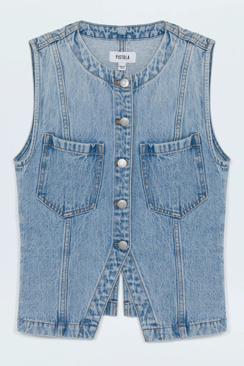 The GIA Vest is crafted from our premium rigid denim, engineered to maintain its striking shape and structure wear after wear. Thoughtful seaming details subtly elevate your look, complemented by sleek chest pockets and a modern split hem.