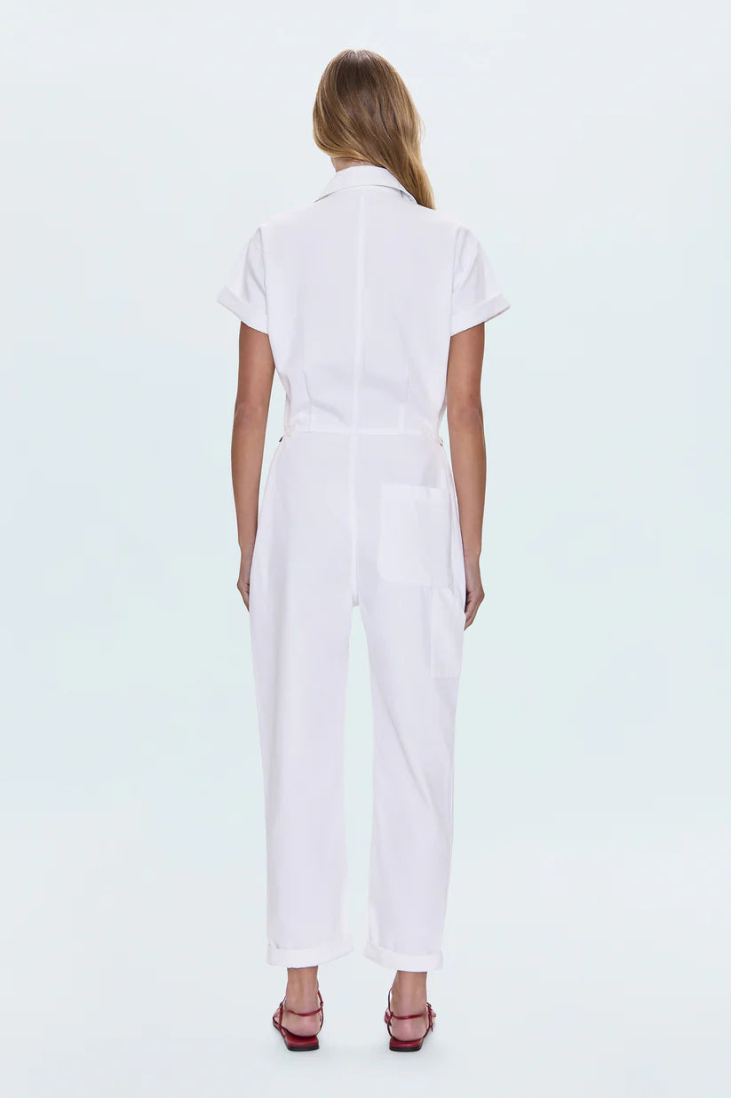 All-in-one outfitting, expertly realized in our best selling jumpsuit silhouette. Designed for a relaxed fit, with a button up bodice and waist for adjustable coverage and fit options. Vivid White is a pure white wash for a fresh, versatile look.&nbsp;