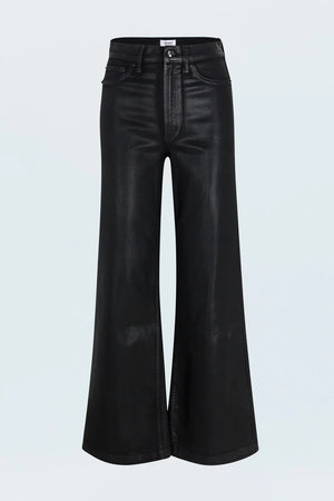 Black flared jeans on a light gray background
