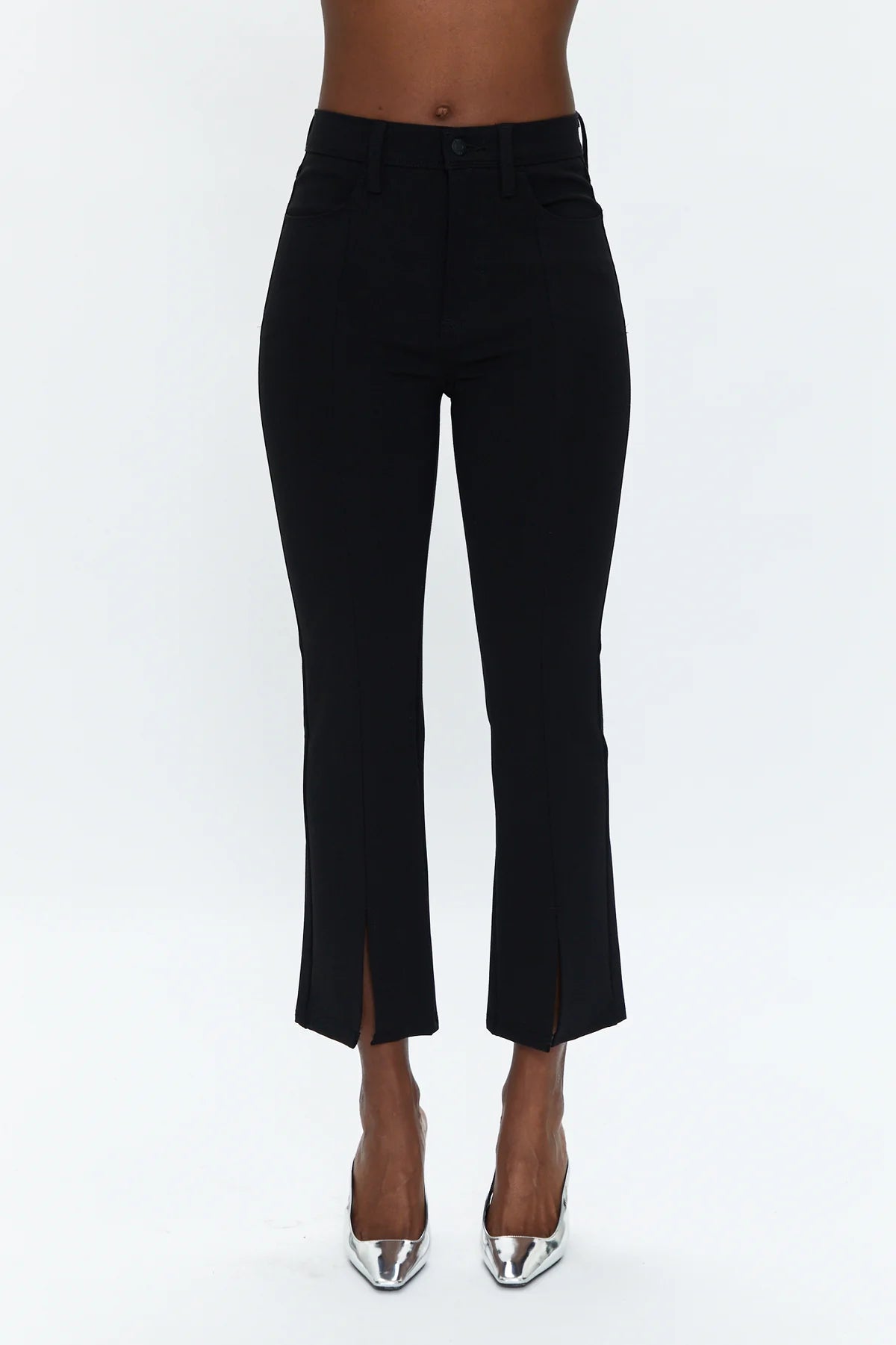 A chic pant you can everywhere, all the time. In a cropped boot cut fit, it hugs you from the hips to knee and flares out right above the calf for a proportional effect. Featured in a rich saturated black with center front slits at the hem, this pant is made in our super stretchy Ponte fabric that comfortably holds you in.