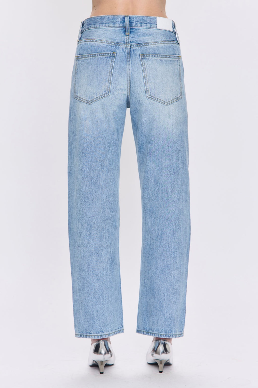 Light blue jeans on a white background