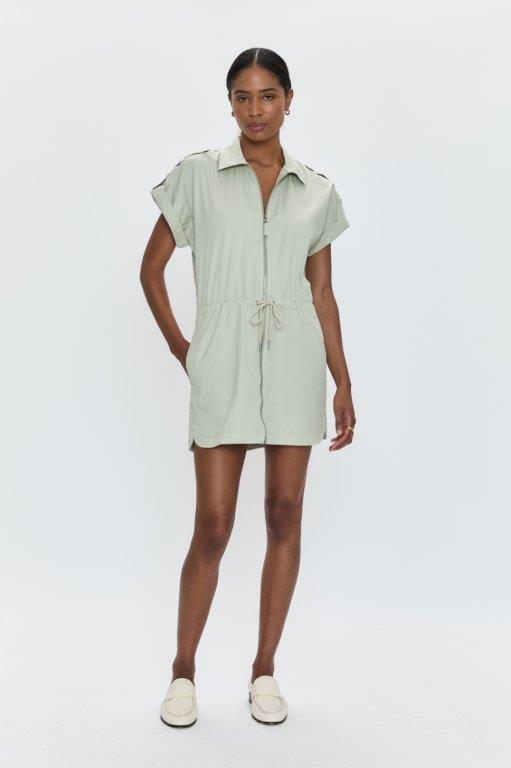 Slip into this draw-string mini dress and unleash your inner fashionista. The Pistola | Meg dress combines style and comfort for a relaxed yet chic look. Perfect for any occasion, this dress will have you feeling confident and looking fabulous.