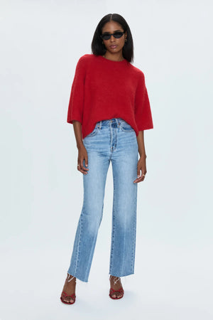 Medium weight wool knit blend with an ultra soft hand feel. Crafted into a relaxed, boxy tee silhouette with a crew neckline, dropped shoulders, and medium length half sleeves. Relaxed ribbing on sleeves, neckline, and hem. Offered in a rich, vibrant red hue.