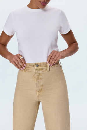 Meet the Penny Crop in Sand Dollar, designed to be your new everyday essential. These jeans feature a high-rise waist that flatters and defines, flowing into a chic wide-leg silhouette. The cropped, ankle-length hemline is perfect for showcasing your favorite footwear. Crafted from our signature comfort stretch denim, they offer unparalleled flexibility and a perfect fit that moves with you. Thoughtful details like a double-stitched waistline and modern scissor-cut hems add a touch of refined edge. 