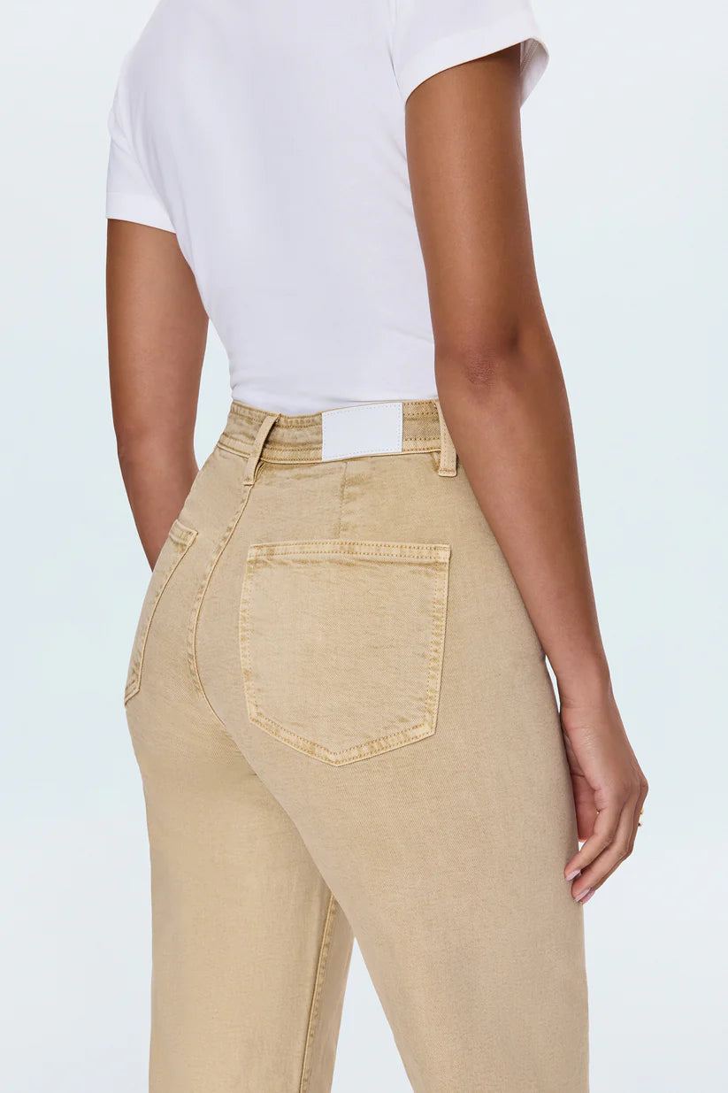 Meet the Penny Crop in Sand Dollar, designed to be your new everyday essential. These jeans feature a high-rise waist that flatters and defines, flowing into a chic wide-leg silhouette. The cropped, ankle-length hemline is perfect for showcasing your favorite footwear. Crafted from our signature comfort stretch denim, they offer unparalleled flexibility and a perfect fit that moves with you. Thoughtful details like a double-stitched waistline and modern scissor-cut hems add a touch of refined edge. 
