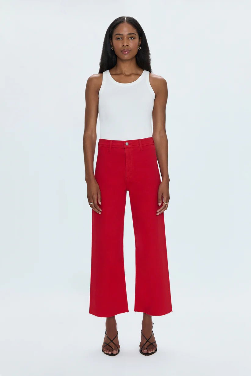 High rise waist, with a wide leg silhouette and a cropped, ankle length hemline. Crafted from our signature comfort stretch denim, with a double stitched waistline and scissor cut hems. Ruby is a vibrant red colored denim that's exclusively ours.