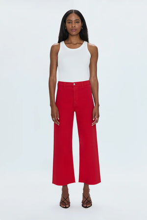 High rise waist, with a wide leg silhouette and a cropped, ankle length hemline. Crafted from our signature comfort stretch denim, with a double stitched waistline and scissor cut hems. Ruby is a vibrant red colored denim that's exclusively ours.