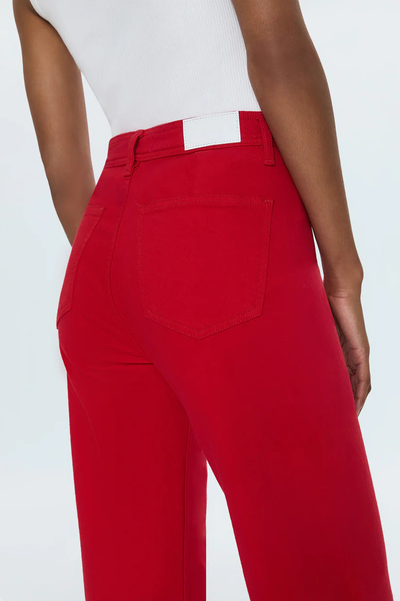 High rise waist, with a wide leg silhouette and a cropped, ankle length hemline. Crafted from our signature comfort stretch denim, with a double stitched waistline and scissor cut hems. Ruby is a vibrant red colored denim that's exclusively ours.