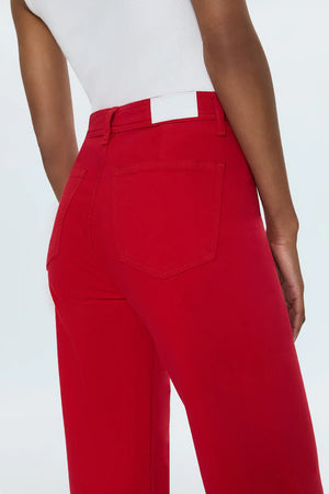 High rise waist, with a wide leg silhouette and a cropped, ankle length hemline. Crafted from our signature comfort stretch denim, with a double stitched waistline and scissor cut hems. Ruby is a vibrant red colored denim that's exclusively ours.