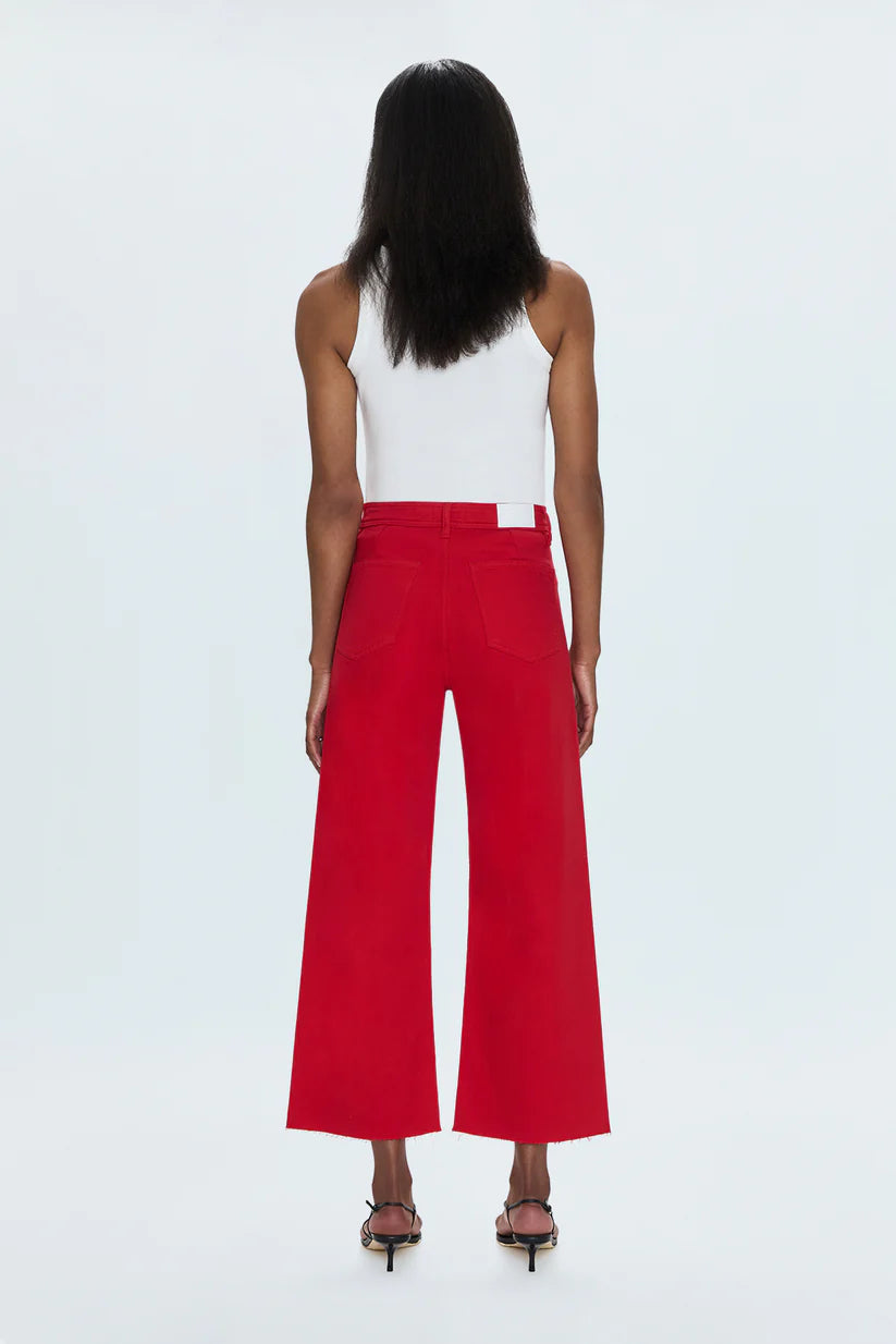 High rise waist, with a wide leg silhouette and a cropped, ankle length hemline. Crafted from our signature comfort stretch denim, with a double stitched waistline and scissor cut hems. Ruby is a vibrant red colored denim that's exclusively ours.