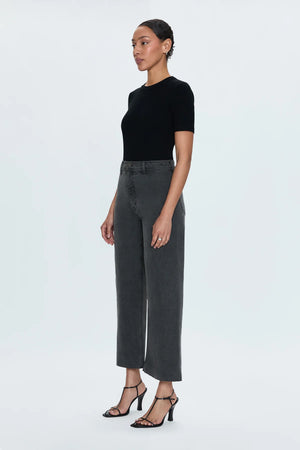 High rise waist, with a wide leg silhouette and a cropped, ankle length hemline.Crafted from our signature comfort stretch denim, with a double stitched waistline and scissor cut hems.