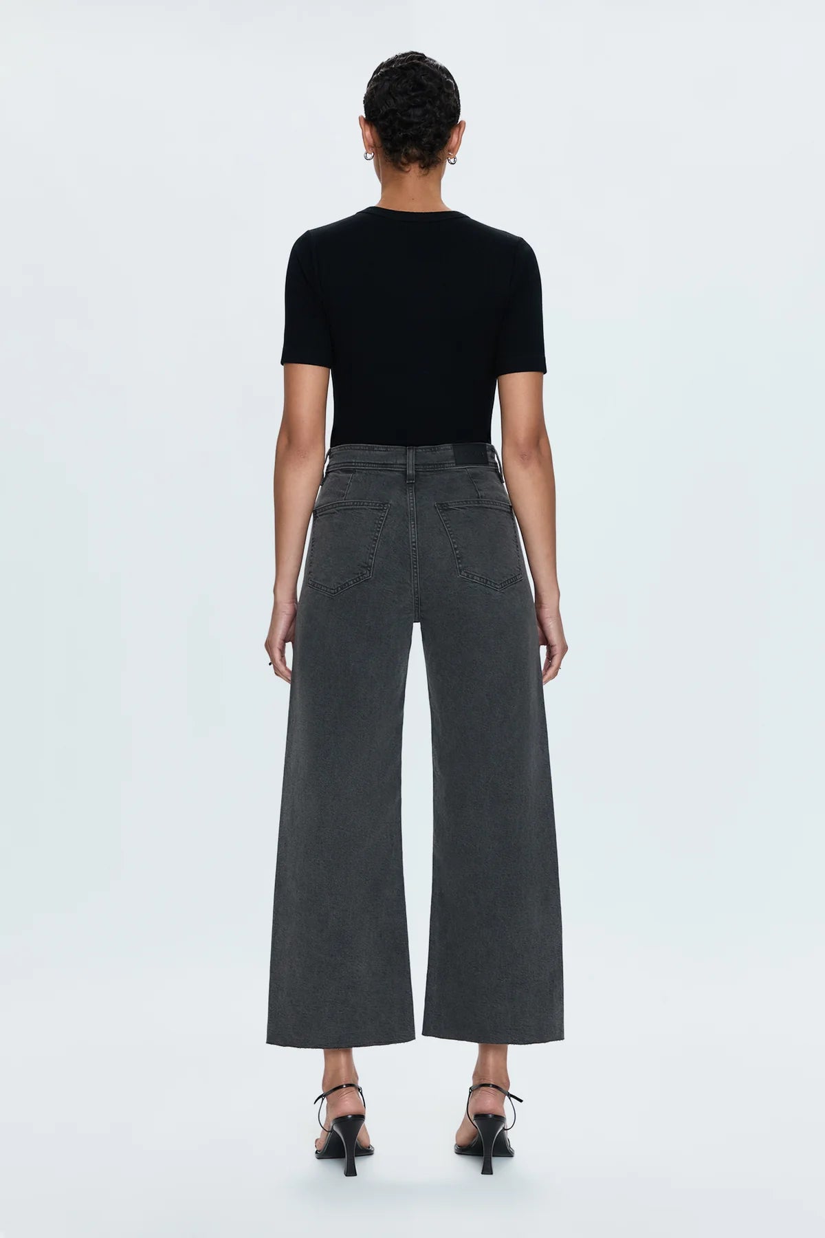 High rise waist, with a wide leg silhouette and a cropped, ankle length hemline.Crafted from our signature comfort stretch denim, with a double stitched waistline and scissor cut hems.