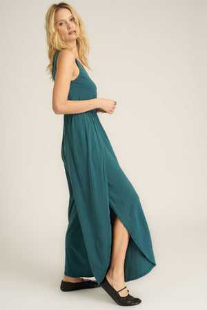 The Do It Again Scoop Neck Jumpsuit features a soft jersey fabric that creates the perfect drape in this relaxed silhouette. The elasticized waist creates a flattering look, while the curved hemline with side slits keeps this playful. I mean... think about how many ways you can wear this. Just saying.