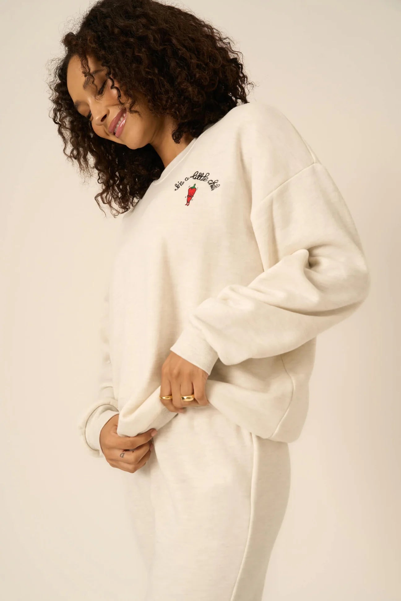 The I'm A Little Chili Sweatshirt features the cutest chili graphic on the chest that adds just the right amount of heat. This sweatshirt features our ultra-soft fleece with a relaxed fit, crew neckline, drop shoulders, and an embroidery screenprint combo on the chest. Pair with your favorite pair of joggers or a high-waisted jean for a comfortable and cute vibe.