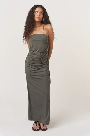 The Nala Strapless Side Ruched Dress is a need, not a want. The strapless neckline and fitted silhouette are made extra flattering thanks to the side ruching details. The maxi length keeps it on-trend, and the side slit keeps it flirty.