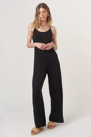 The Night Moves Tie Back Jumpsuit brings effortless chic to any occasion. With a relaxed, flattering fit and a bold strappy back detail, this jumpsuit seamlessly transitions from daytime ease to evening elegance.