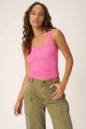 The Soirée Side Ruched Tank proves that simple style doesn't have to be boring. This soft ribbed tank features a square neckline and a fitted silhouette. The extra details like side ruching and a curved hemline add some feminine flair, making this one perfect for tucking into belted leather pants and heels for GNO.