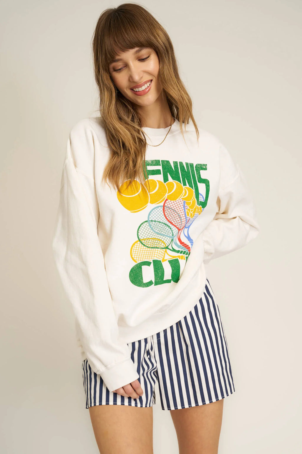 We love all our sweatshirts, but this might be our fave this season.  The Tennis Club Sweatshirt deserves a spot in your weekend style rotation, whether you're headed to the country club or not. This relaxed silhouette features a crew neckline, drop shoulders, and a soft terry fabric. Add this to cart and add serving practice to your weekend to-dos.