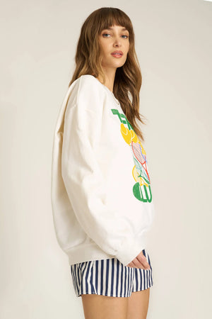 We love all our sweatshirts, but this might be our fave this season.  The Tennis Club Sweatshirt deserves a spot in your weekend style rotation, whether you're headed to the country club or not. This relaxed silhouette features a crew neckline, drop shoulders, and a soft terry fabric. Add this to cart and add serving practice to your weekend to-dos.