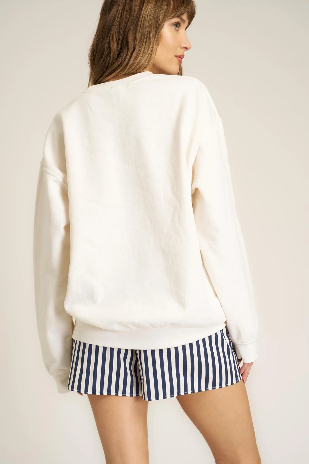 We love all our sweatshirts, but this might be our fave this season.  The Tennis Club Sweatshirt deserves a spot in your weekend style rotation, whether you're headed to the country club or not. This relaxed silhouette features a crew neckline, drop shoulders, and a soft terry fabric. Add this to cart and add serving practice to your weekend to-dos.