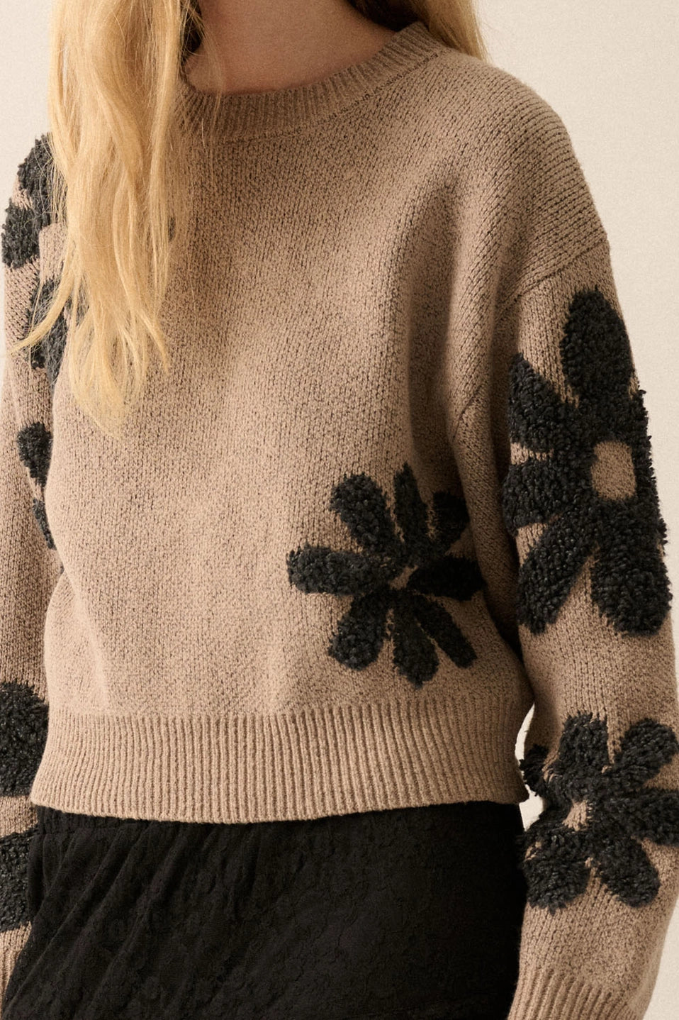 Add some sunshine to your wardrobe with Promesa's Floral Chenille Jacquard Crewneck Sweater. The soft chenille fabric and playful floral pattern will keep you cozy and stylish all season long. Don't let the cold weather dull your shine - embrace the sunshine with Promesa.