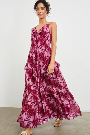 An ultra-feminine maxi designed for day-to-night wear. The Boa is crafted from ultra-lightweight chiffon with frills along neckline and seams, as well as an adjustable back tie. It features an empire waistline for a flowing silhouette, ensuring optimum comfort.