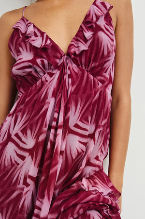 An ultra-feminine maxi designed for day-to-night wear. The Boa is crafted from ultra-lightweight chiffon with frills along neckline and seams, as well as an adjustable back tie. It features an empire waistline for a flowing silhouette, ensuring optimum comfort.