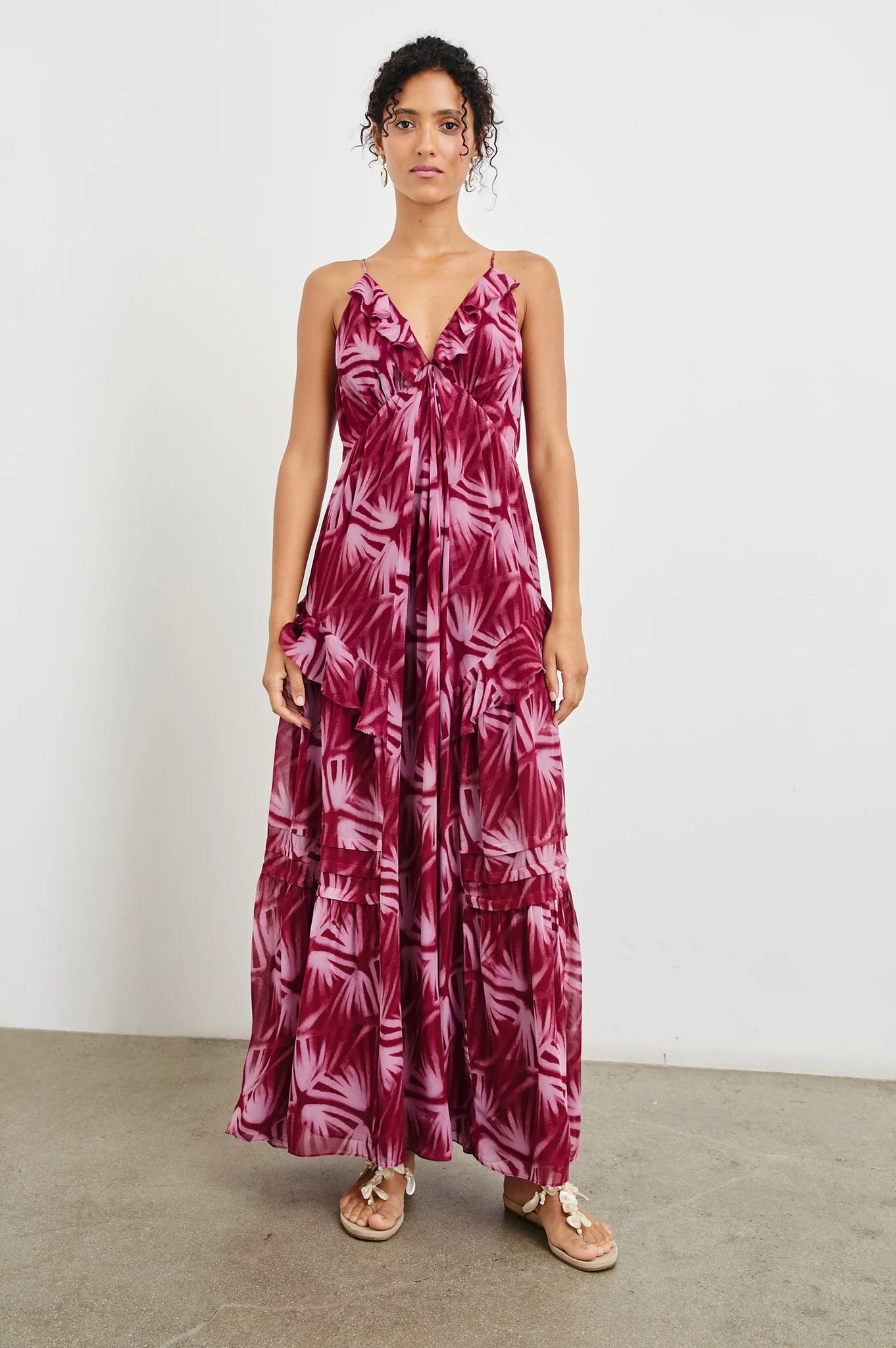 An ultra-feminine maxi designed for day-to-night wear. The Boa is crafted from ultra-lightweight chiffon with frills along neckline and seams, as well as an adjustable back tie. It features an empire waistline for a flowing silhouette, ensuring optimum comfort.