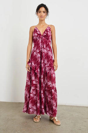 An ultra-feminine maxi designed for day-to-night wear. The Boa is crafted from ultra-lightweight chiffon with frills along neckline and seams, as well as an adjustable back tie. It features an empire waistline for a flowing silhouette, ensuring optimum comfort.