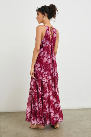 An ultra-feminine maxi designed for day-to-night wear. The Boa is crafted from ultra-lightweight chiffon with frills along neckline and seams, as well as an adjustable back tie. It features an empire waistline for a flowing silhouette, ensuring optimum comfort.