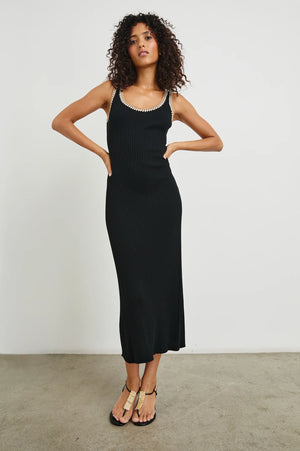 The Colleen is a body-contouring tank midi-dress. Crafted from ultra-soft ribbed cotton, it's finished with a crochet trim and flares slightly at the hem.