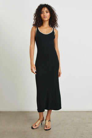 The Colleen is a body-contouring tank midi-dress. Crafted from ultra-soft ribbed cotton, it's finished with a crochet trim and flares slightly at the hem.