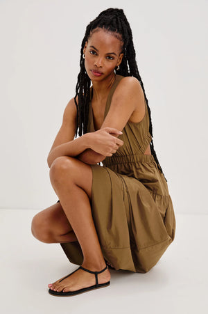 The Genevieve maxi dress is designed for effortless wear, featuring a flattering A-line fit and a cut-out detail at the back.