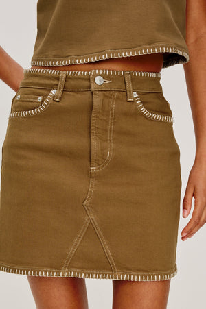 Inspired by 'It' girls of the 90s, the Laurel is a high-rise mini with a fitted waist, zipper fly, and A-line shape. Complete with a contrast white blanket stitch in a 100% cotton fabrication, this skirt is an instant classic.