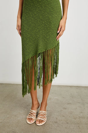 This asymmetrical fringe dress is just as fun to wear as it looks. Made from high-quality crochet knit, Rylee can be dressed up or down for any outing this season.
