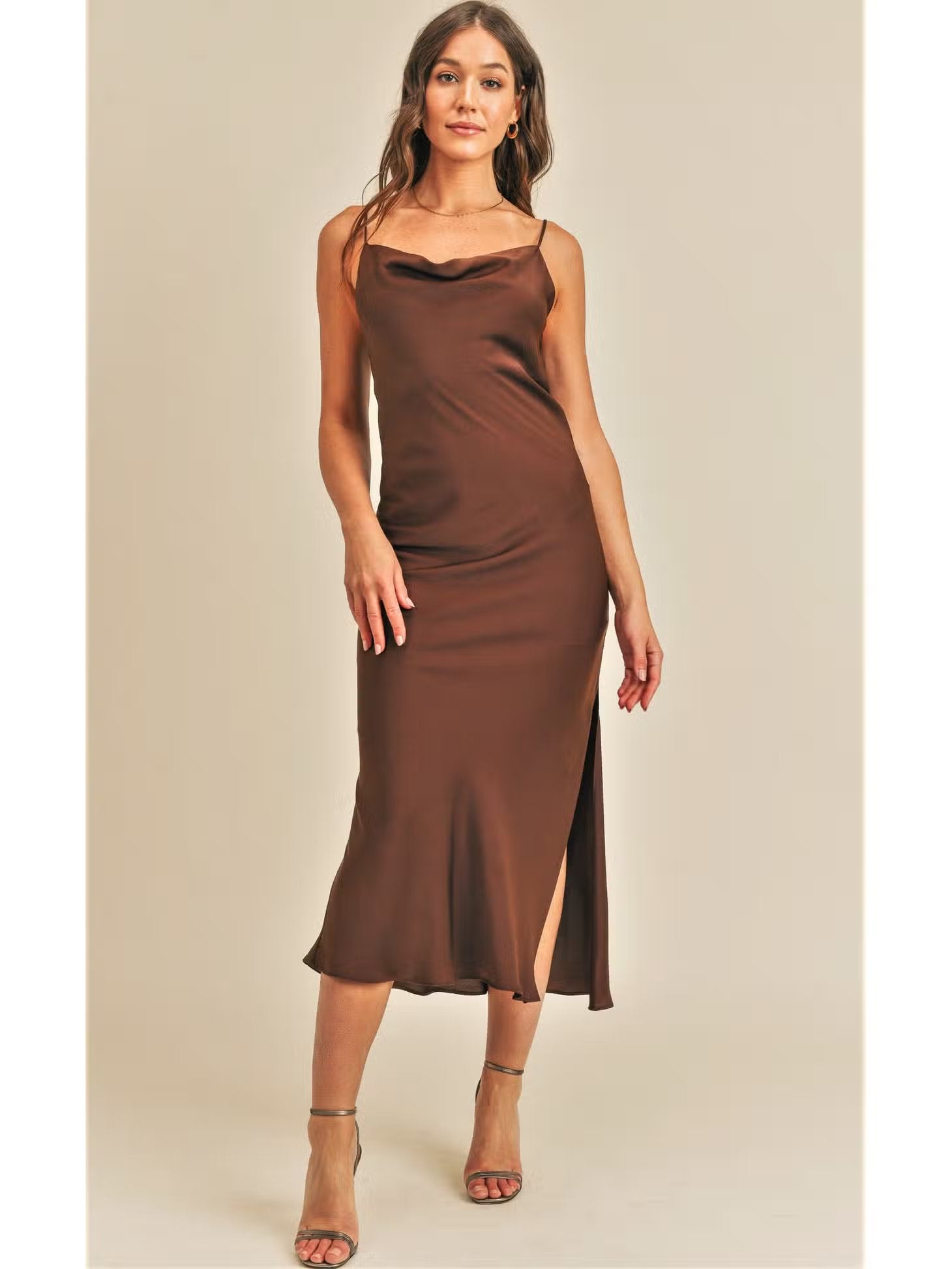 Look gorgeous and feel comfortable with the Rest By Jane Florence Dress - a silky midi with a cowl neck that'll give you a timeless, yet modern look. The perfect combination of luxury and relaxation for any occasion!