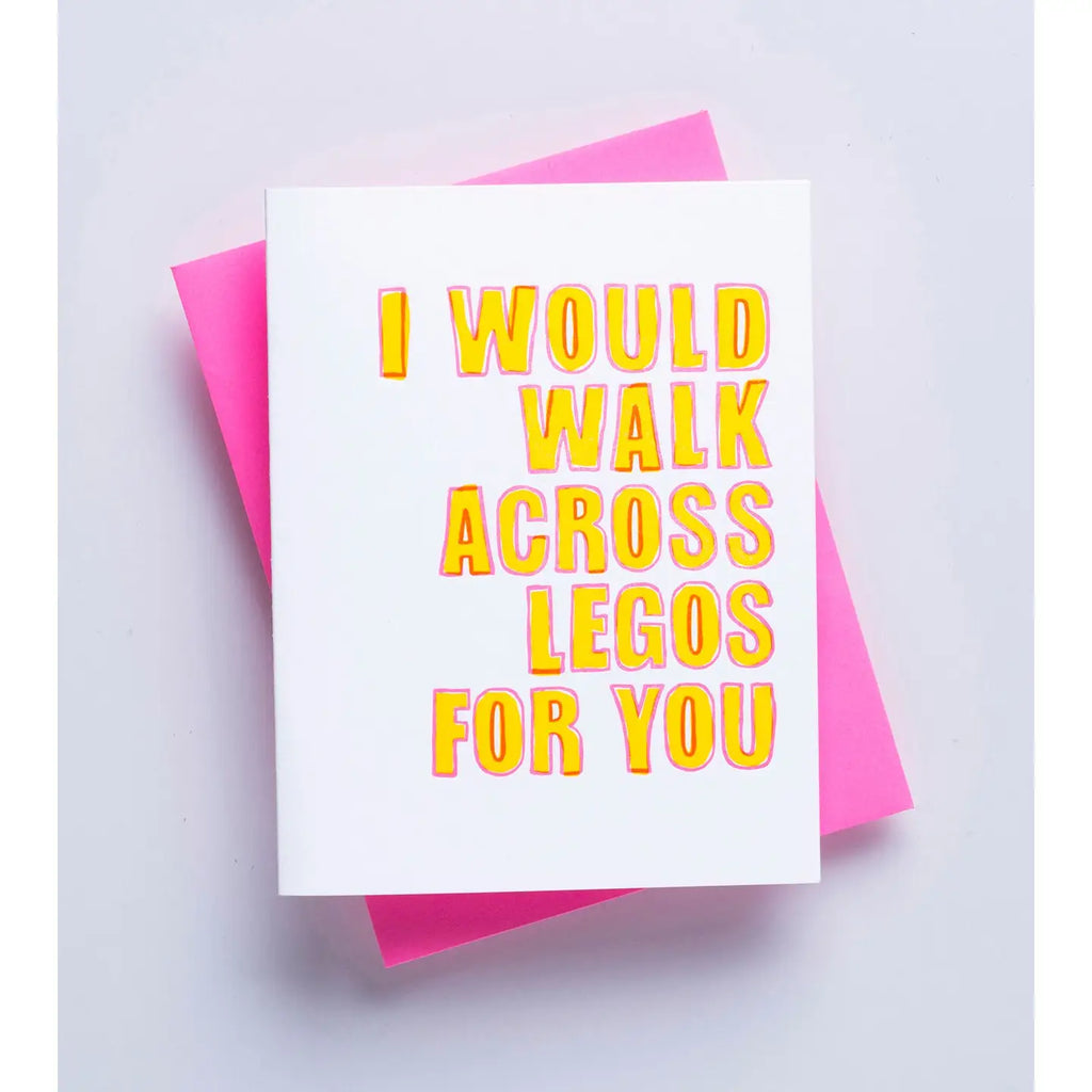 Greeting card with 'I would walk across legos for you' text on a white background