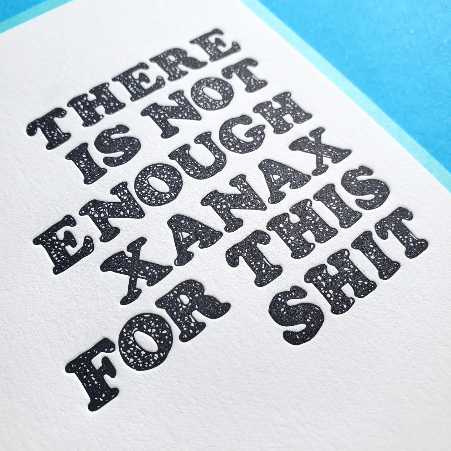 Text on a white background with black letters, featuring a blue border.