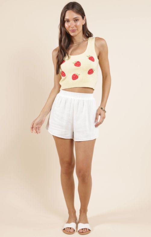 Indulge in the deliciously embroidered Sadie & Sage Berry Cake tank. This playful piece will add a sweet touch to any outfit, bringing out your inner fashionista. Perfect for a day out or a night on the town, it's a must-have addition to your wardrobe!