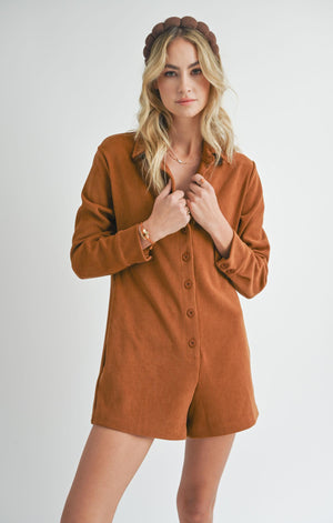 Unleash your creative side in the Sadie &amp; Sage Artful romper. Made with soft and stretchy corduroy, this romper allows for comfort and effortless movement. Get ready to make a statement and turn heads in this unique and playful piece.&nbsp;