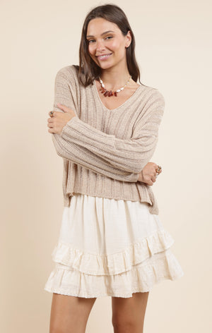 Cozy up in the Sadie & Sage Devon sweater, featuring a charming wide rib knit that adds texture and warmth. Perfect for layering or wearing solo, this playful piece brings a fun twist to your casual wardrobe while keeping you snug all day long.