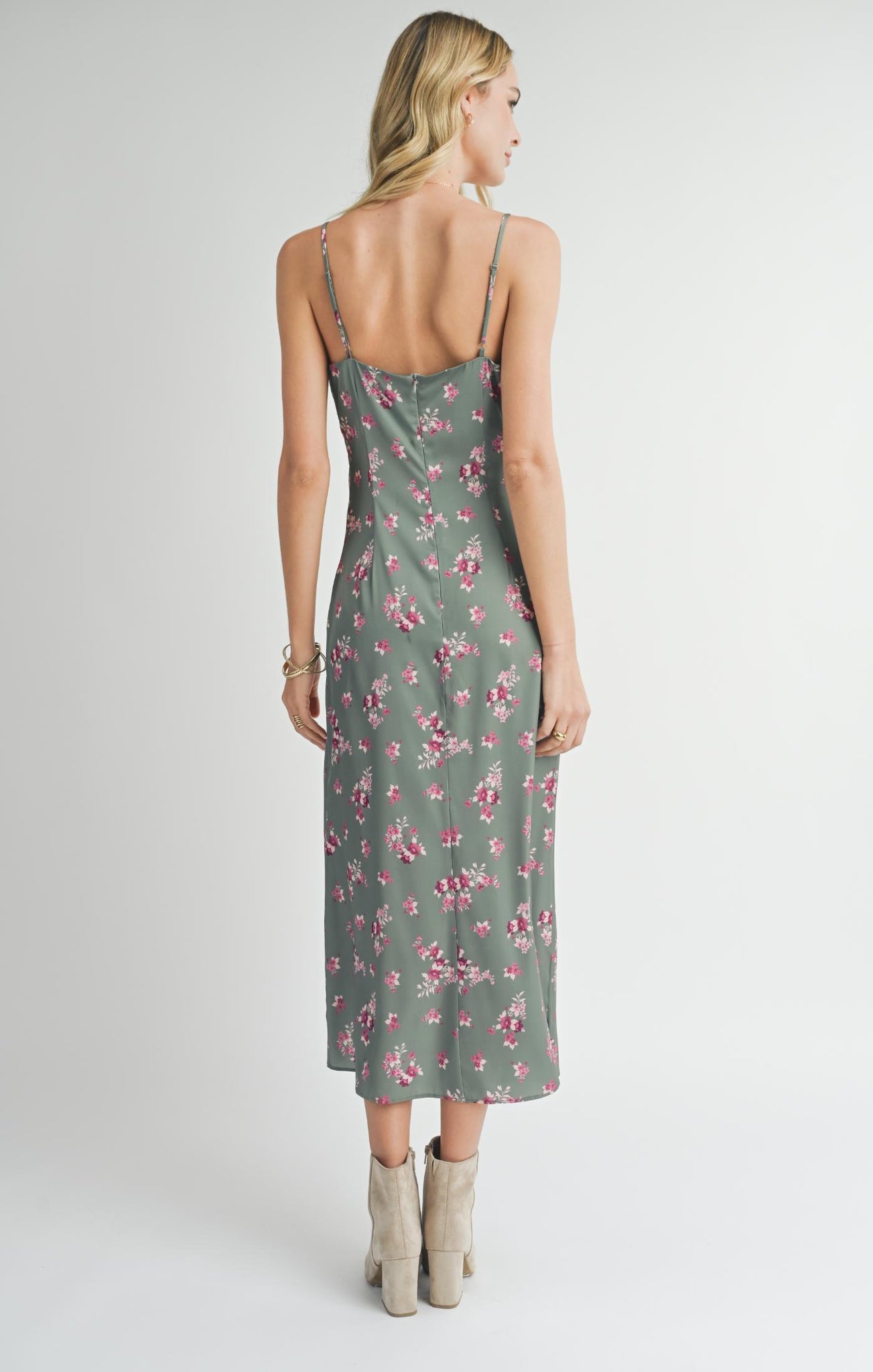 Get ready to slay in this V-neck slip maxi dress from Sadie &amp; Sage. Perfect for hosting your next party, it's the ultimate combination of style and comfort. With its flowy silhouette and on-trend neckline, you'll be the talk of the town (in the best way possible, of course). Bring on the compliments!