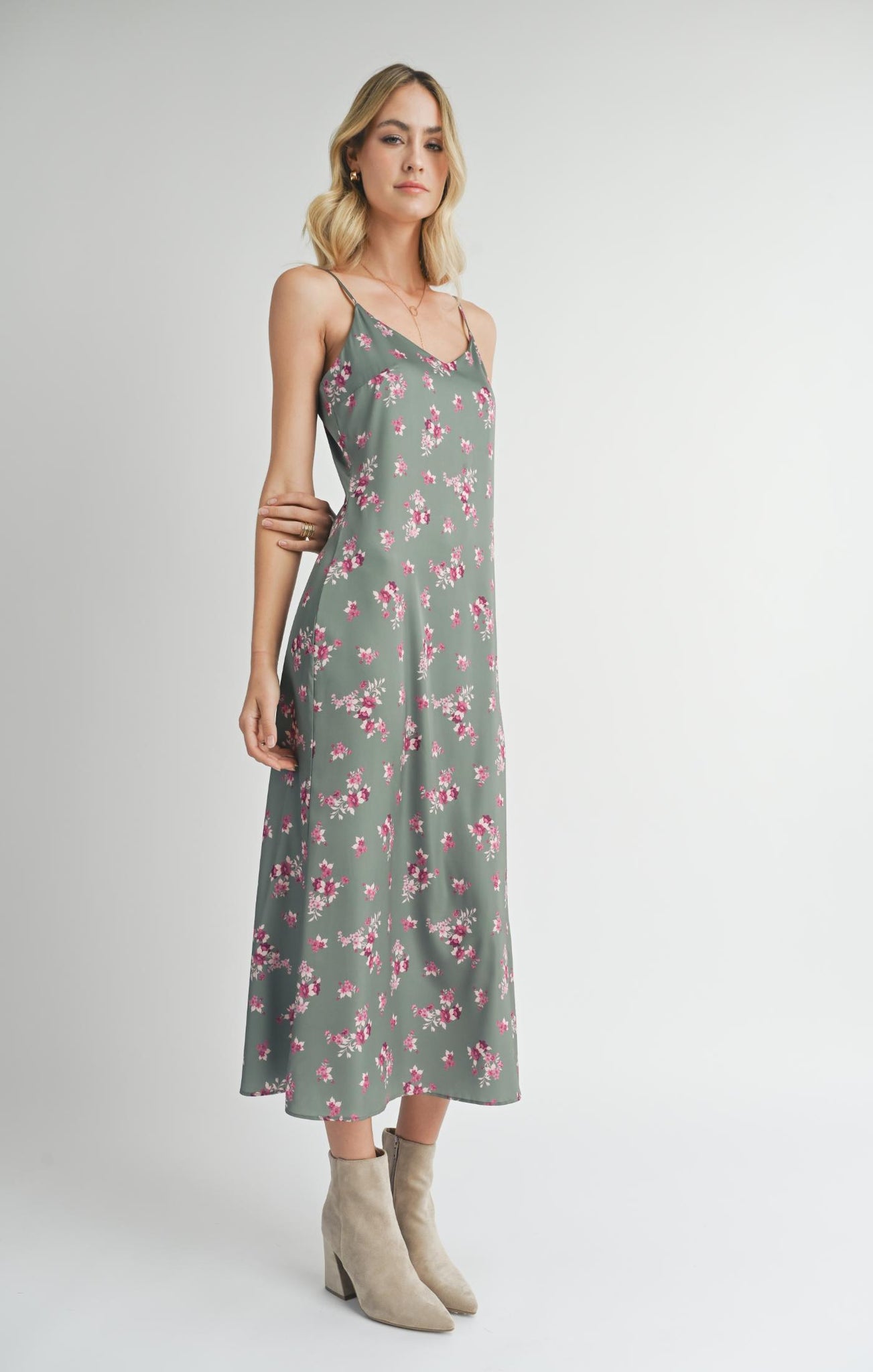 Get ready to slay in this V-neck slip maxi dress from Sadie &amp; Sage. Perfect for hosting your next party, it's the ultimate combination of style and comfort. With its flowy silhouette and on-trend neckline, you'll be the talk of the town (in the best way possible, of course). Bring on the compliments!