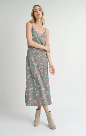 Get ready to slay in this V-neck slip maxi dress from Sadie &amp; Sage. Perfect for hosting your next party, it's the ultimate combination of style and comfort. With its flowy silhouette and on-trend neckline, you'll be the talk of the town (in the best way possible, of course). Bring on the compliments!